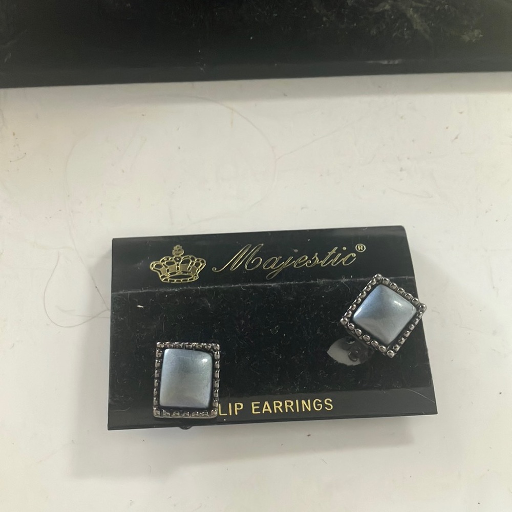 Majestic Silver tone Clip Earrings